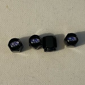 Subaru logo valve Stem caps in black set of 4 NWT